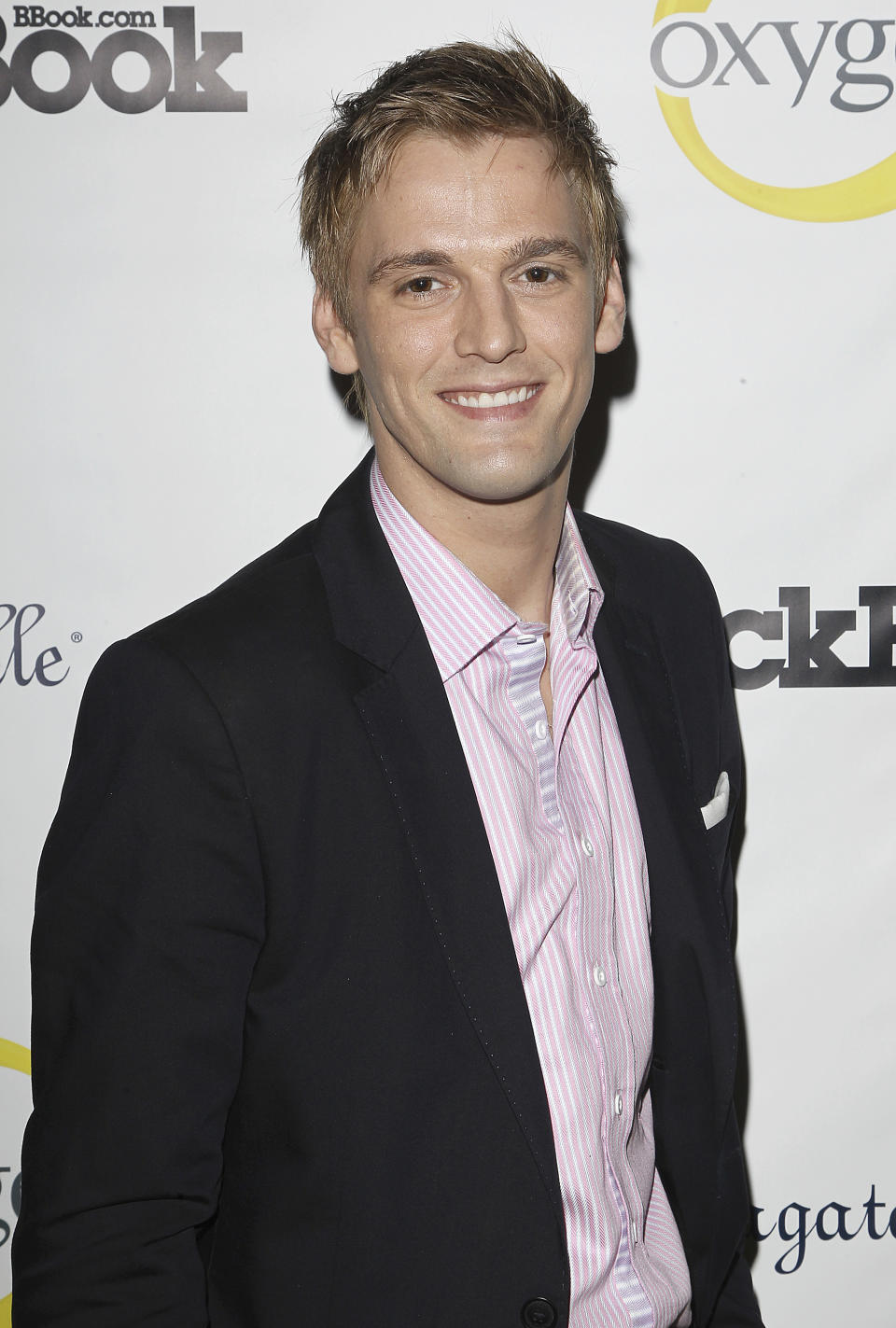 FILE - Singer Aaron Carter is seen at Fashion' s Night Out - Hollywood Unzipped Party on Thursday Sept. 6, 2012, in New York. Carter accidentally drowned in his bathtub due to sedatives he'd taken and gas used in spray cleaners he had inhaled, a coroner's report said Tuesday. The singer-rapper who began performing as a child and had hit albums starting in his teen years, was found dead Nov. 5, 2022, at his home in Southern California. He was 34. (Photo by Donald Traill/Invision/AP Images, File)