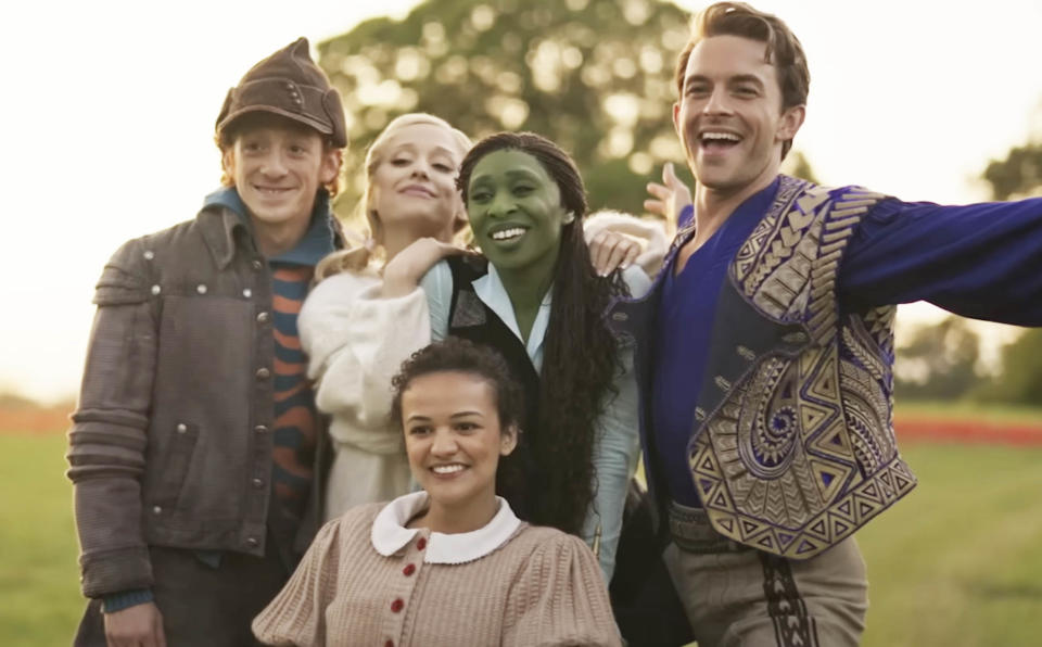 Ethan Slater, Ariana Grande, Cynthia Erivo, Jonathan Bailey, and Marissa Bode in costume for the film "Wicked"