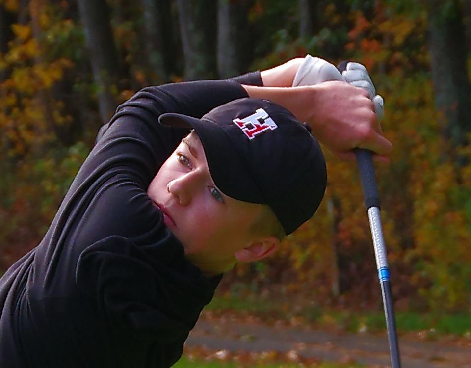 Drew Golden of Hingham watches his tee shot sail into the air during MIAA Golf Tourney action at the Easton Country Club on Monday, Oct. 23, 2023.