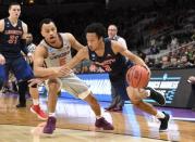 Mar 24, 2019; San Jose, CA, USA; Liberty Flames guard Darius McGhee (2) drives against Virginia Tech Hokies guard Justin Robinson (5) during the first half in the second round of the 2019 NCAA Tournament at SAP Center. Mandatory Credit: Kelley L Cox-USA TODAY Sports