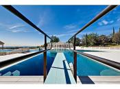 A view of the pool from the diving board.