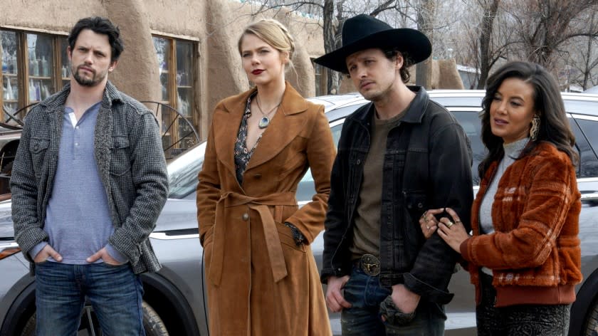 Nathan Dean, left, Lily Cowles, Michael Vlamis and Heather Hemmes in "Roswell, New Mexico" on The CW.