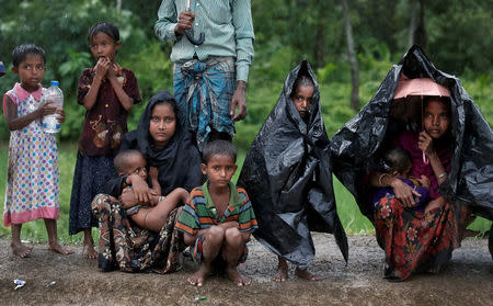 Rohingya refugees wait for aid in Cox's Bazar, Bangladesh, September 20, 2017. REUTERS/Cathal McNaughton