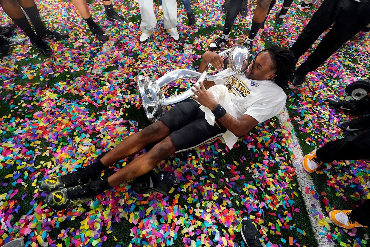 Missouri wide receiver Marquis Johnson celebrates the team's win over Ohio State in the Cotton Bowl NCAA college football game Friday, Dec. 29, 2023, in Arlington, Texas. (AP Photo/Julio Cortez)