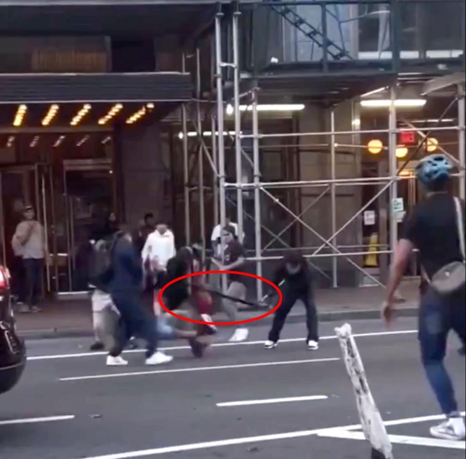 More than a dozen migrants were caught on video in a wild, broad-daylight brawl outside The Row hotel in Midtown. @CANELATRD/X