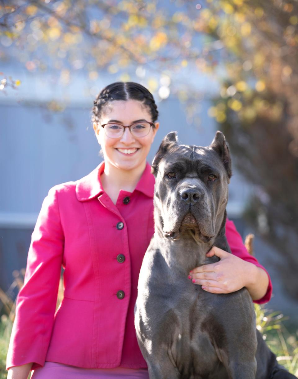 Lihi Ruvio, 17, stands with her Cane Corso dog named Sage. Sage will compete in Westminster for the first time in May.