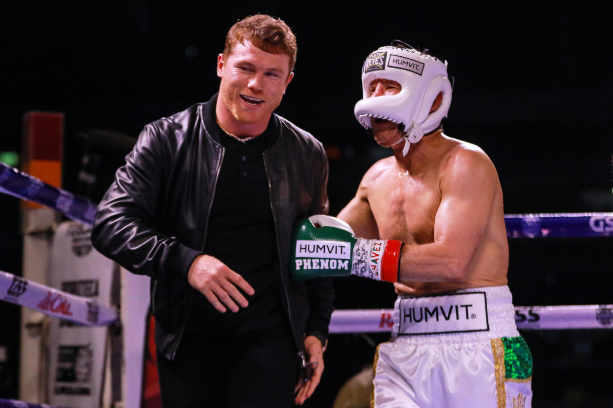 GUADALAJARA, MEXICO - JUNE 19: Julio Cesar Chavez (R) and Saul 