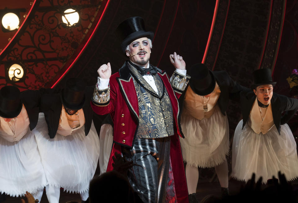 Boy George, center, is pictured on stage during the curtain call for his debut performance in "Moulin Rouge! The Musical" at the Al Hirschfeld Theatre on Tuesday, Feb. 6, 2024, in New York. (Photo by Evan Agostini/Invision/AP)