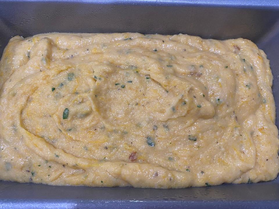 Pumpkin bread batter in a pan.