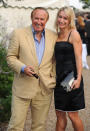 Andrew Neil and girlfriend arriving at the Sir David Frost Summer Garden Party 2009, Carlyle Square in Chelsea, central London.