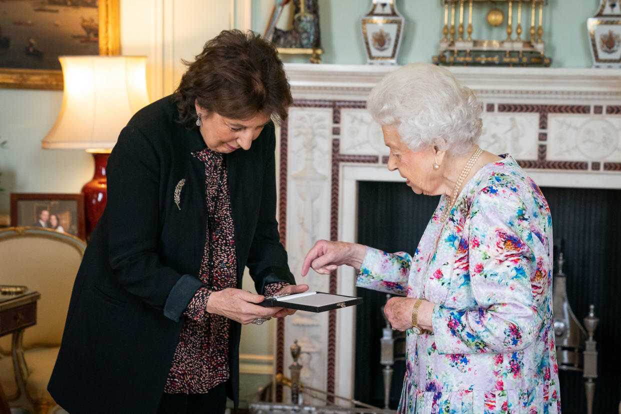 Dame Imogen Cooper is received by Queen Elizabeth II at Buckingham Palace where she was presented with The Queen's Medal for Music for 2019.