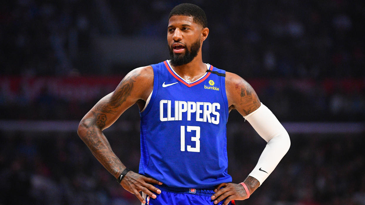 LOS ANGELES, CA - MARCH 01: Los Angeles Clippers Forward Paul George (13) looks on during a NBA game between the Philadelphia 76ers and the Los Angeles Clippers on March 1, 2020 at STAPLES Center in Los Angeles, CA.