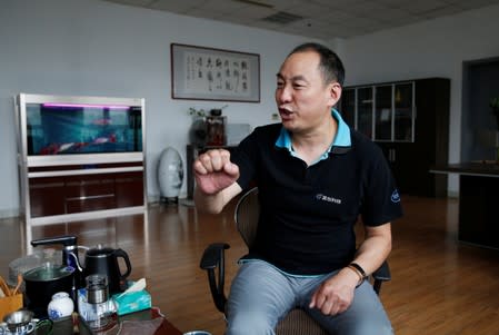 Li Libo, CEO of Lanchuang Network Technology Corp, speaks during an interview at his office in Weifang