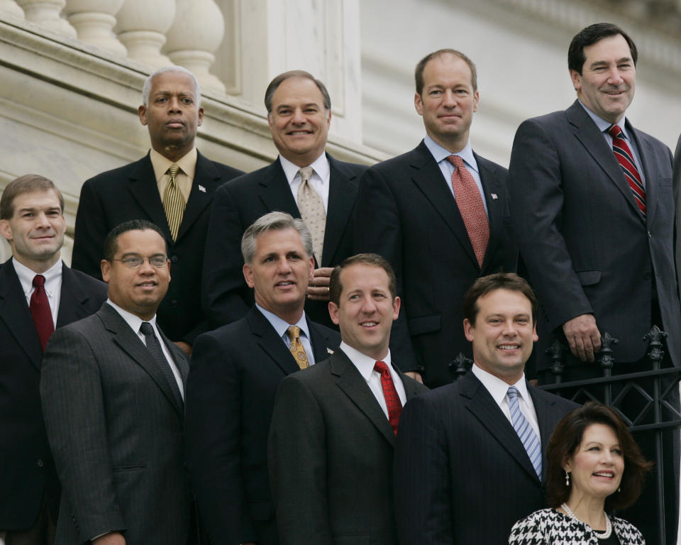 FILE - Newly-elected members of the House pose for a group photo on the steps of the Capitol in Washington, Tuesday, Nov. 14, 2006. Top row, from left are, Hank Johnson, D-Ga., Nick Lampson, D-Texas, Peter Roskam, R-Ill., and Joe Donnelly, D-Ind. Bottom row, from left: Jim Jordan, R-Ohio, Keith Ellison, D-Minn., Kevin McCarthy, R-Calif., Adrian Smith, R-Neb., Heath Shuler, D-N.C., and Michele Bachmann, R-Minn. (AP Photo/J. Scott Applewhite, File)
