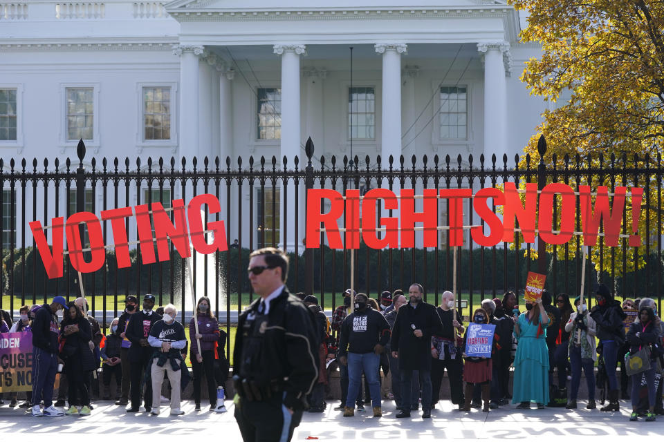 Protesters gather outside the White House to urge the Biden administration to pursue voting rights legislation, Wednesday, Nov. 17, 2021, in Washington. / Credit: Patrick Semansky / AP