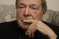 Cardinal George Pell ponders a question during an interview with the Associated Press inside his residence near the Vatican in Rome, Monday, Nov. 30, 2020. The pope’s former treasurer, who was convicted and then acquitted of sexual abuse in his native Australia, said Monday he feels a dismayed sense of vindication as the financial mismanagement he tried to uncover in the Holy See is now being exposed in a spiraling Vatican corruption investigation. (AP Photo/Gregorio Borgia)