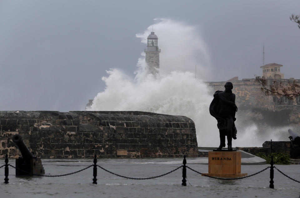 <p>Waves crash against the lighthouse after the passing of Hurricane Irma, in Havana, Cuba, Sept. 10, 2017. (Photo: Stringer/Reuters) </p>