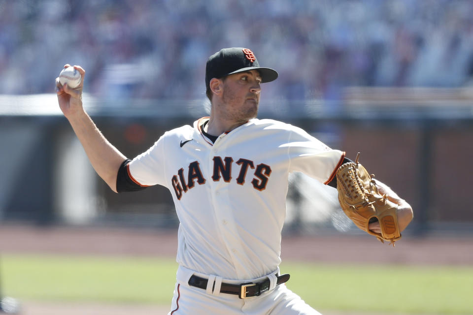 SAN FRANCISCO, CALIFORNIA - SEPTEMBER 24: Kevin Gausman #34 of the San Francisco Giants pitches in the top of the first inning against the Colorado Rockies at Oracle Park on September 24, 2020 in San Francisco, California. (Photo by Lachlan Cunningham/Getty Images)