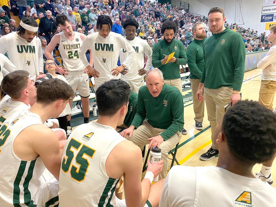 Vermont coach John Becker gives instructions to his team during a timeout in the Catamount's 79-57 win over Binghamton in the America East semifinals on Tuesday night at Patrick Gym.