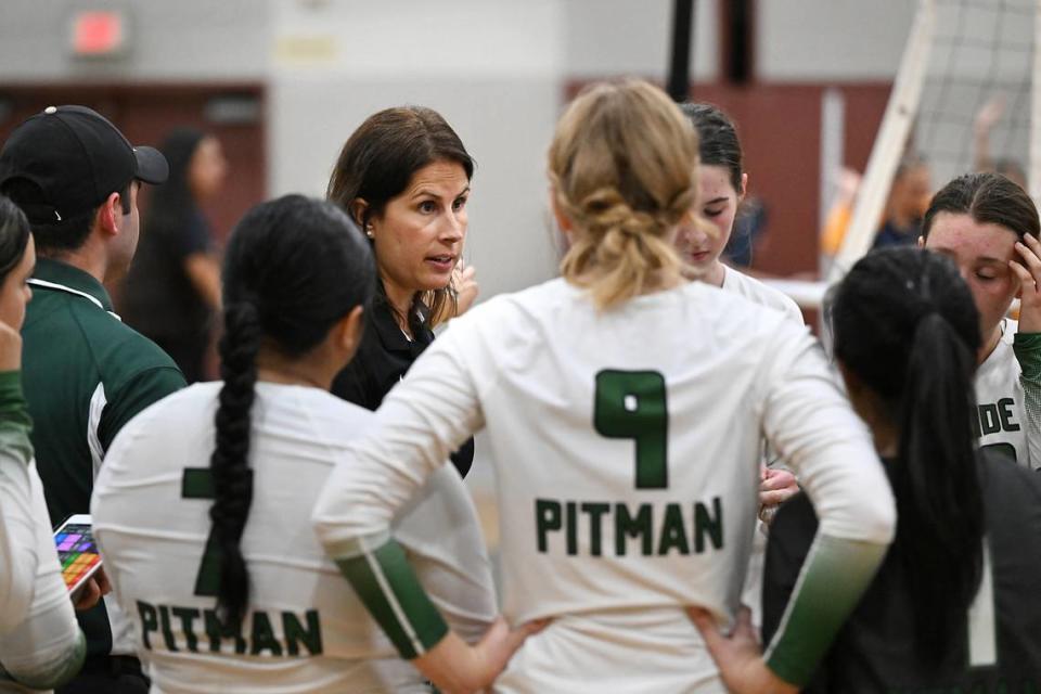 Pitman High coach Kristen Pontes-Christian talks with her players during a match with Oak Ridge at Pitman High School in Turlock, Calif., Thursday, September 7, 2023.