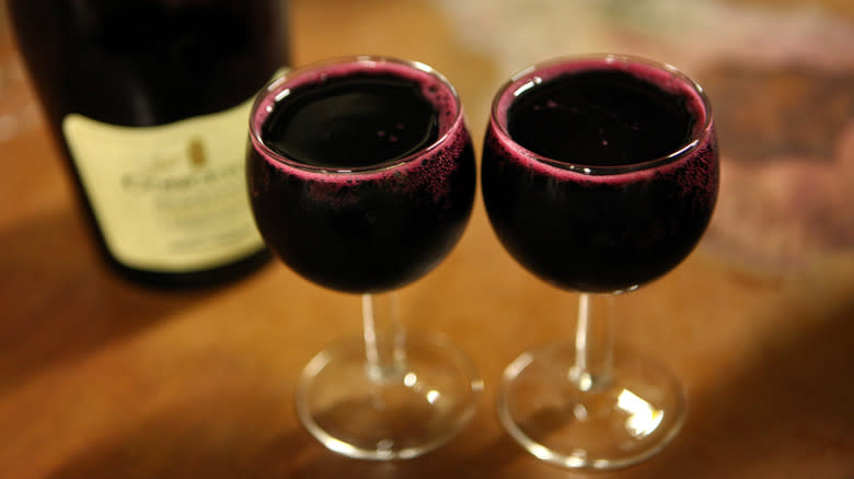 Lambrusco bottle with glasses of red wine