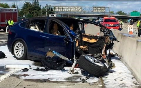 Tesla crash - Credit: KTVU