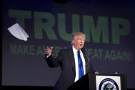 <p>Trump tosses his notes as he speaks during a Suffolk County Republican Committee fundraising reception, April 14, 2016, in Patchogue, N.Y. <i>(AP Photo/Mary Altaffer)</i> </p>