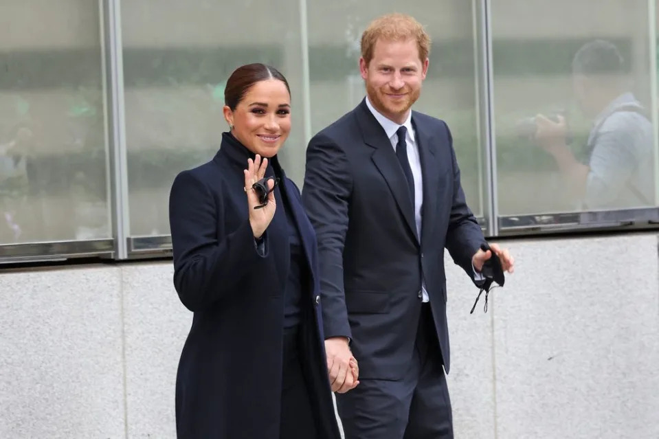 Meghan and Harry walking hand-in-hand 