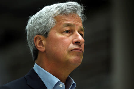 FILE PHOTO: JP Morgan CEO Jamie Dimon speaks at a Remain in the EU campaign event attended by Britain's Chancellor of the Exchequer George Osborne (not shown) at JP Morgan's corporate centre in Bournemouth, southern Britain, June 3, 2016. REUTERS/Dylan Martinez/File Photo