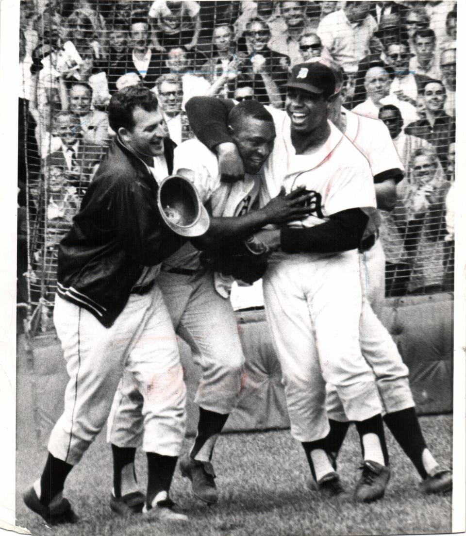 Gates Brown, center, Willie Horton, right, and Mickey Lolich, left, after winning the opener vs. Boston on August 12, 1968.
