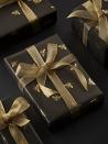<p>Dark grey may not be the obvious choice for Christmas wrapping paper, but it will look luxurious under a softly lit tree – especially as the metallic honey bee motif will shimmer in the light. Pure, unadulterated festive glamour. £13.50 per roll, <a href="https://www.coxandcox.co.uk/deco-bees-wrapping-paper/" rel="nofollow noopener" target="_blank" data-ylk="slk:coxandcox.co.uk;elm:context_link;itc:0;sec:content-canvas" class="link ">coxandcox.co.uk</a></p>