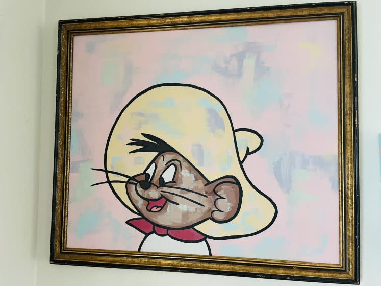 A painting of Speedy Gonzales by artist Dino Perez hangs at the home office of Gustavo Arellano.