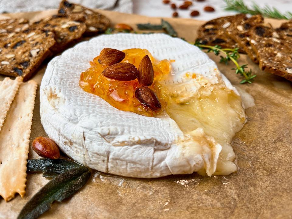 Baked brie will stay warm and gooey for about ten minutes, so be sure to serve straight from the oven.