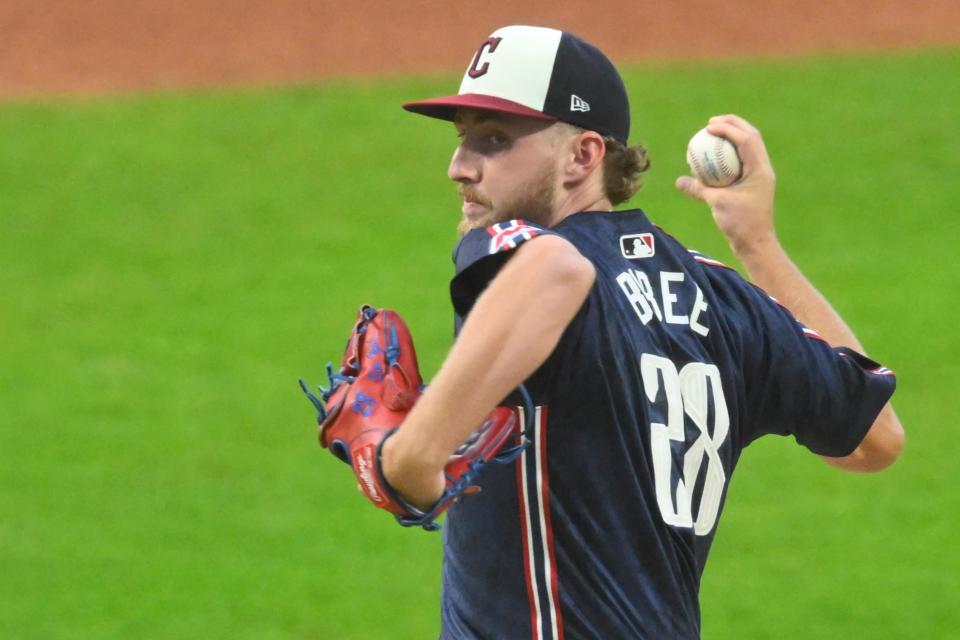 Cleveland Guardians starter pitcher Tanner Bibee (28) delivers a pitch against the Tampa Bay Rays on Friday in Cleveland.