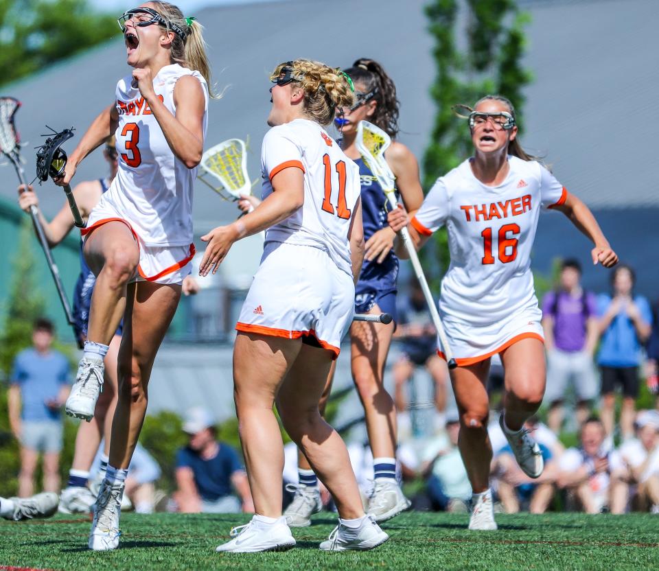 Thayer Academy's Caroline Kendall celebrates a goal during the ISL championship game against Nobles at Milton Academy on Monday, May 23, 2022.