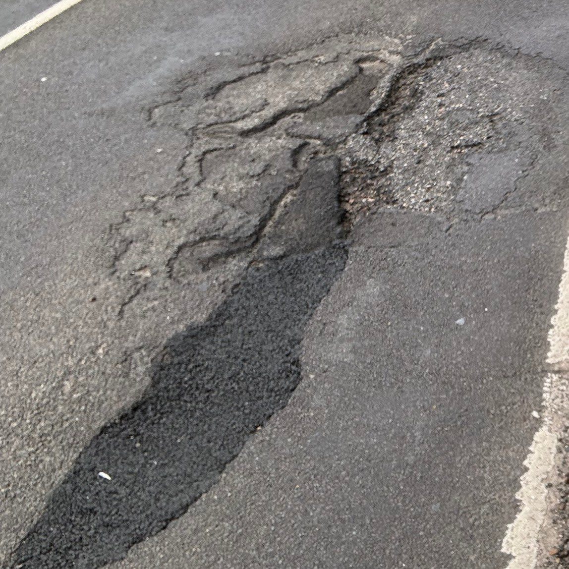 The filled-in pothole