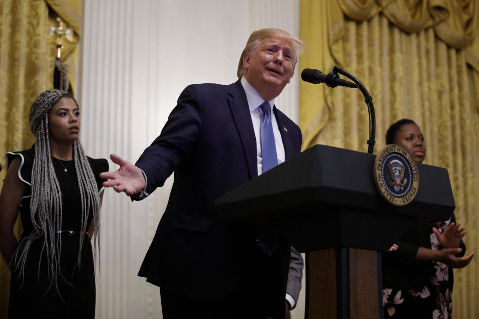 President Donald Trump speaks during the Young Black Leadership Summit at the White House in Washington, Friday, Oct. 4, 2019. At left is Kearyn Bolin, President of TPUSA at Texas State University. (AP Photo/Carolyn Kaster)