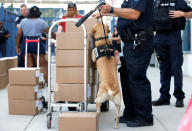 <p>Police officers check boxes before the Democrats and Republicans face off in the annual Congressional Baseball Game at Nationals Park in Washington, June 15, 2017. (Photo: Joshua Roberts/Reuters) </p>