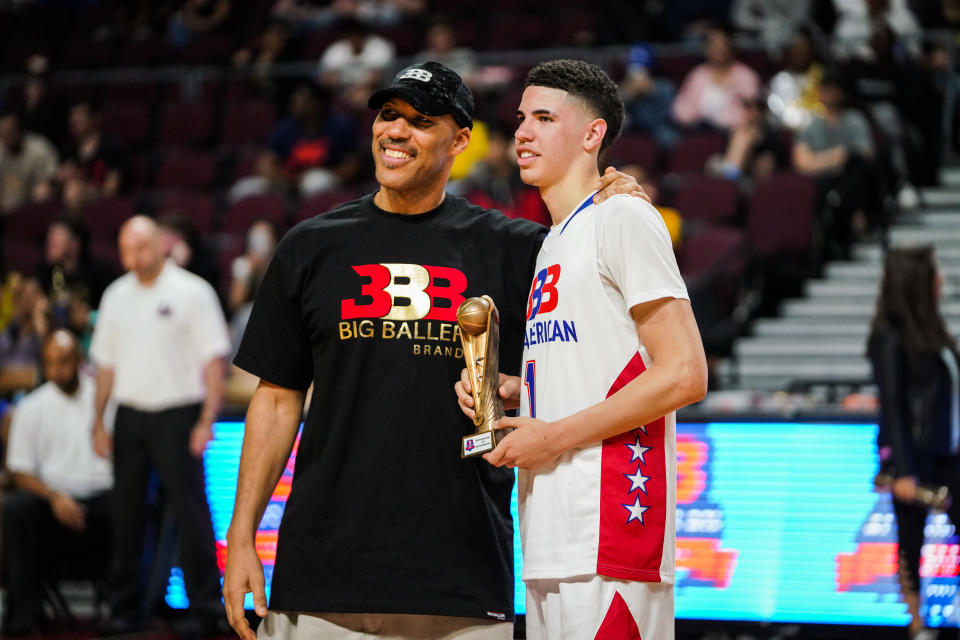 LAS VEGAS, NEVADA - MARCH 31: LaVar Ball presents an award to son LaMelo Ball after the Big Baller Brand All American Game at the Orleans Arena on March 31, 2019 in Las Vegas, Nevada. (Photo by Cassy Athena/Getty Images)