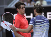 Taylor Fritz, left, of the U.S. congratulates Austria's Dominic Thiem after their third round singles match at the Australian Open tennis championship in Melbourne, Australia, Saturday, Jan. 25, 2020. (AP Photo/Andy Brownbill)