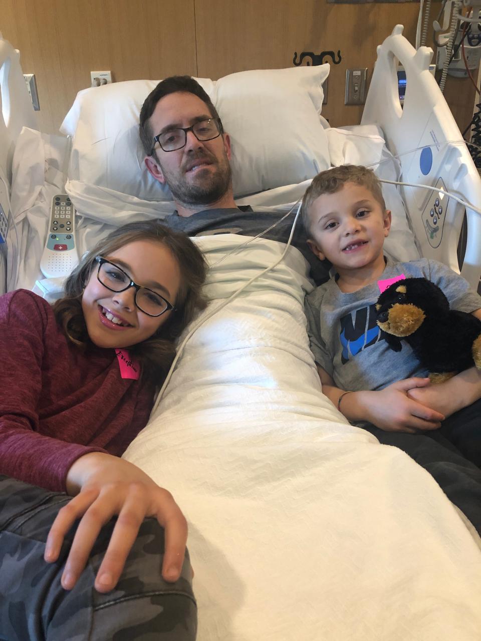 Patrick Frepan in the hospital with his daughter Maggie and son Tyler.