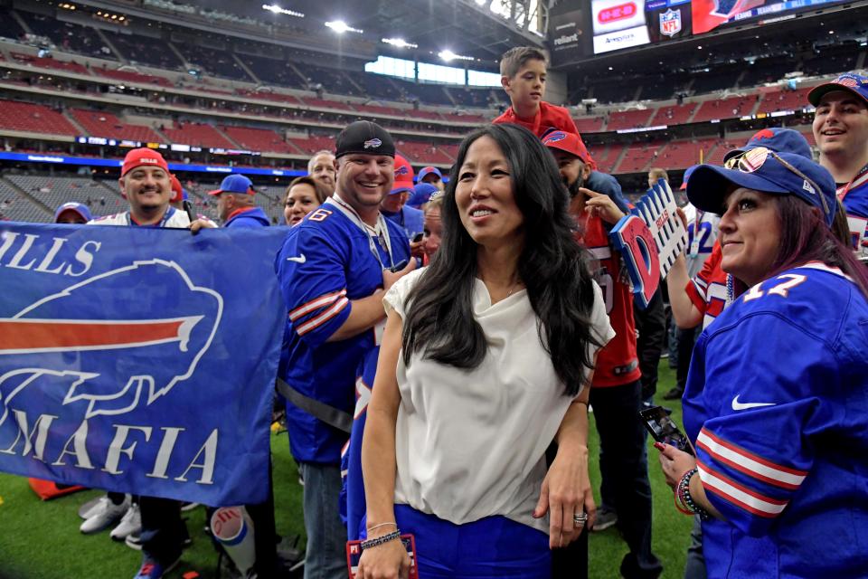 Buffalo Bills owner Kim Pegula poses for picture with fan before the AFC wild card game against the Houston Texans at NRG Stadium in 2020. (Kirby Lee, USA TODAY Sports)