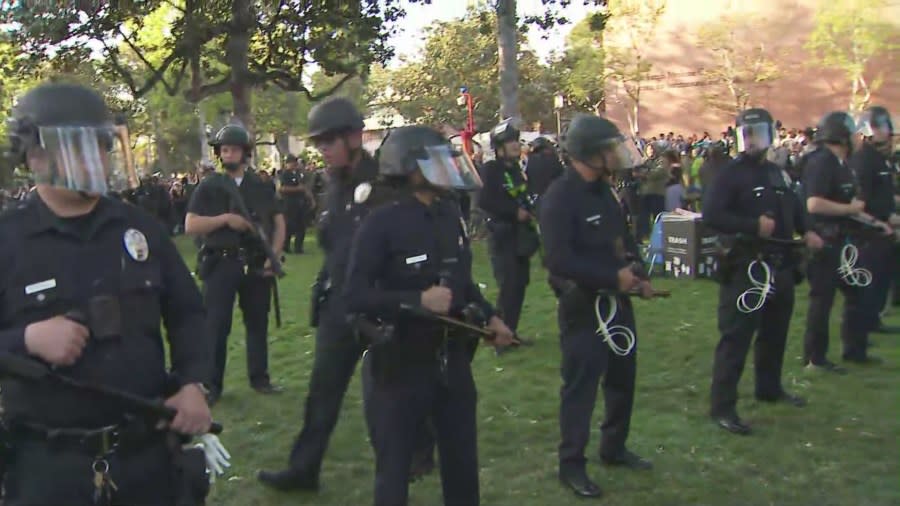 Police in riot gear dispersing pro-Palestinian demonstrators at the University of Southern California on April 24, 2024. (KTLA)