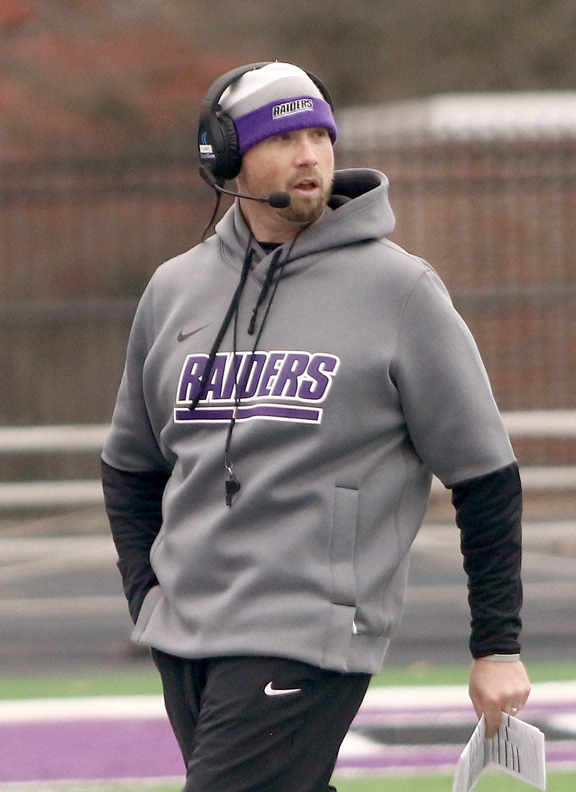 Mount Union head coach Geoff Dartt looks on from the sidelines during last year's playoff game against Johns Hopkins.