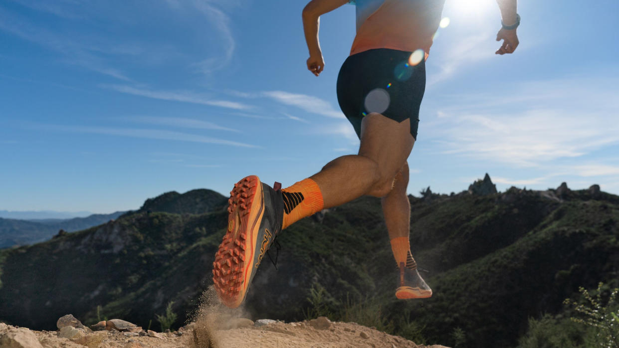  Man running wearing Hoka Zinal 2 shoes 