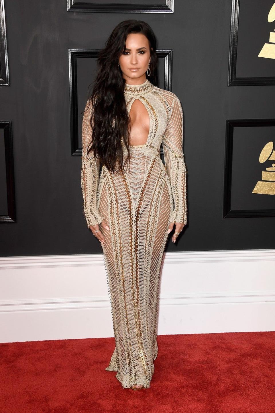 ET's breaking down all of the singer's GRAMMY red carpet looks, ahead of her highly-anticipated performance at the show on Sunday.