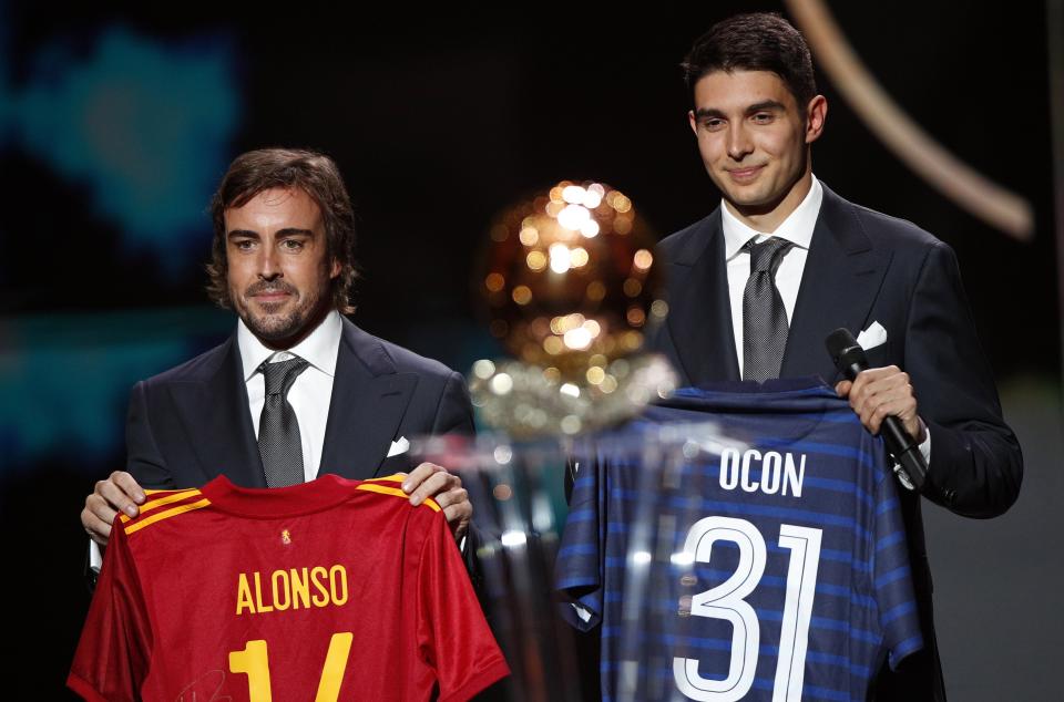 Formula One drivers Fernando Alonso and Esteban Ocon of Alpine F1 Team during the 2021 Ballon d’Or ceremony at Theatre du Chatelet in Paris, France (EPA)