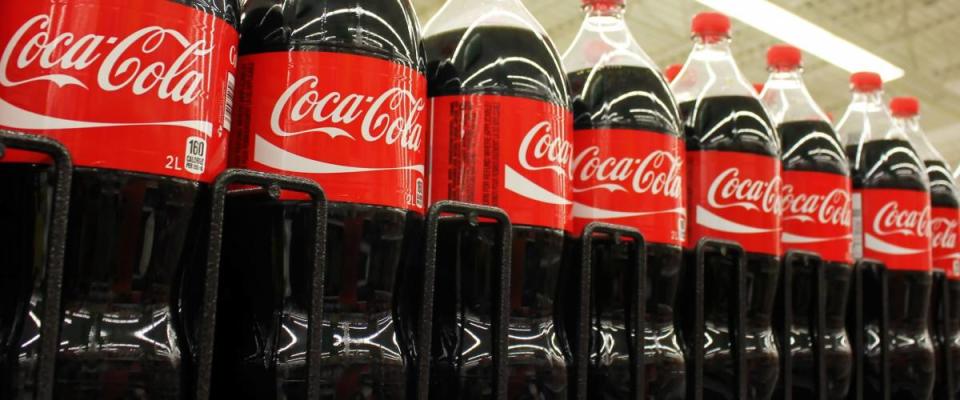 TORONTO, CANADA - OCTOBER 31, 2014: Coca Cola products on display in a grocery store. Coca Cola Company is leading manufacturer of soda drinks  in the world.