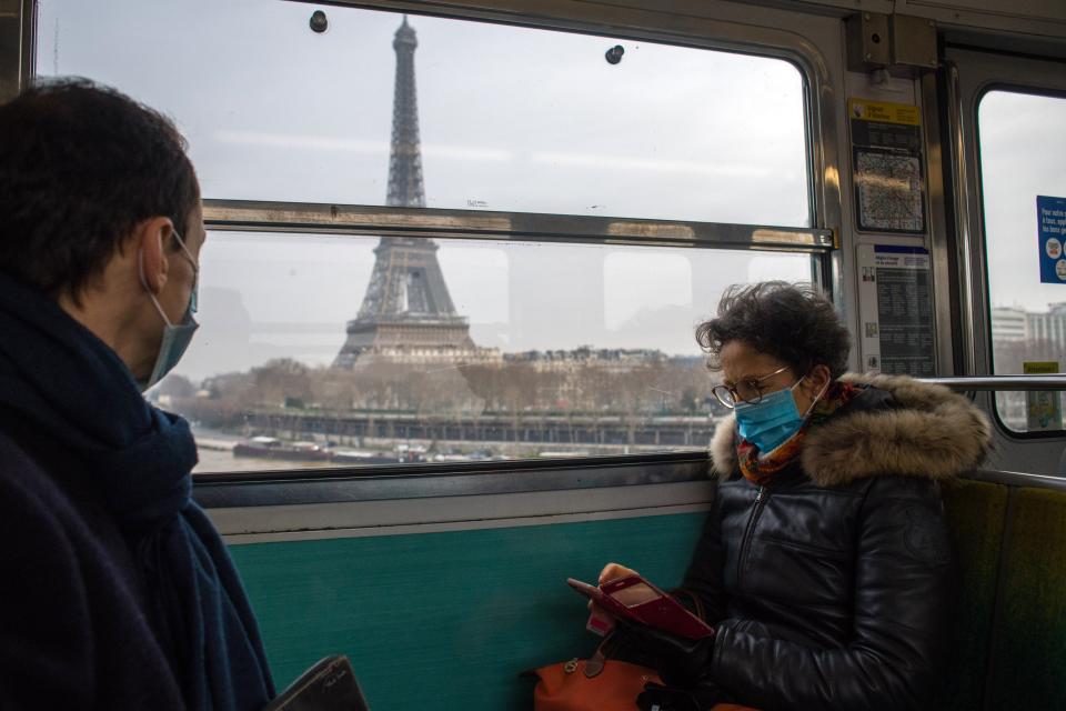 Pictured is a woman on a train in France where cases of Deltacron have been identified.