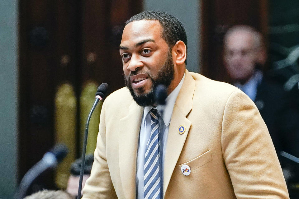 FILE - In this Feb. 19, 2020, file photo, state Rep. Charles Booker advocates for the passage of Kentucky HB-12 on the floor of the House of Representatives in the State Capitol in Frankfort, Ky. Ex-Marine pilot Amy McGrath, who seemed to be gliding toward a primary victory in Kentucky, has come under heavy fire from both directions in the closing days of the Democratic contest to determine who challenges Republican Senate Majority Leader Mitch McConnell in the fall. Booker recently released his first TV ad that says a “real Democrat” is needed to take the fight to McConnell, the top-ranking congressional Republican who is seeking a seventh term. (AP Photo/Bryan Woolston, File)